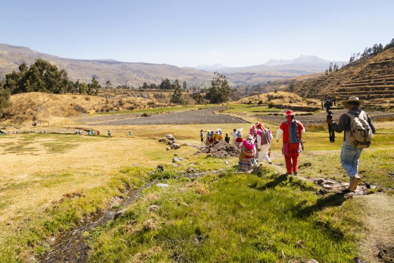Groups hike through the rural landscapes of Caylloma, Perú embracing cultural heritage and nature.